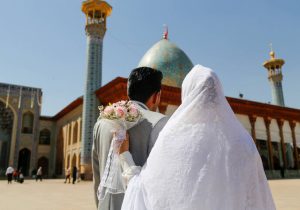برگزاری مراسم عقد ازدواج ۱۲ زوج جوان در حرم شاهچراغ (ع)